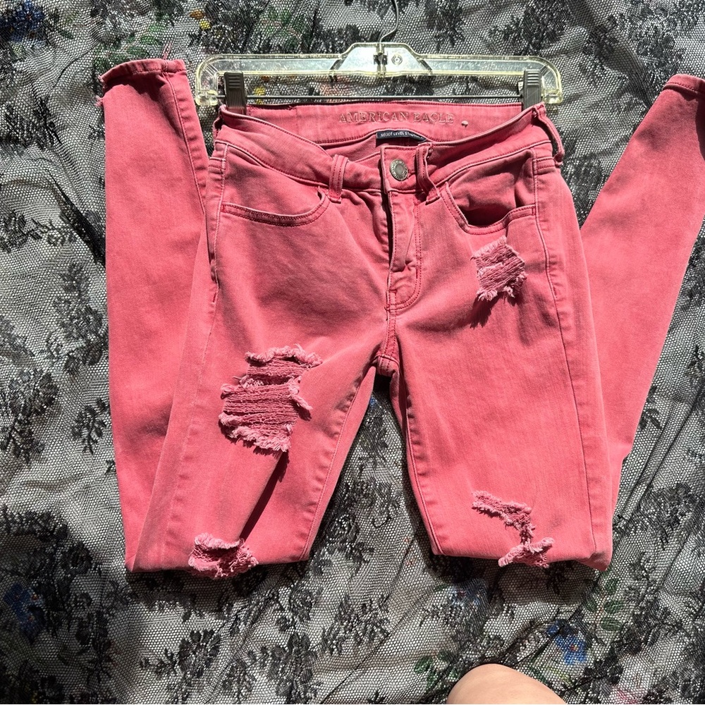 American Eagle next level pink ripped distressed jeggings. Size 2